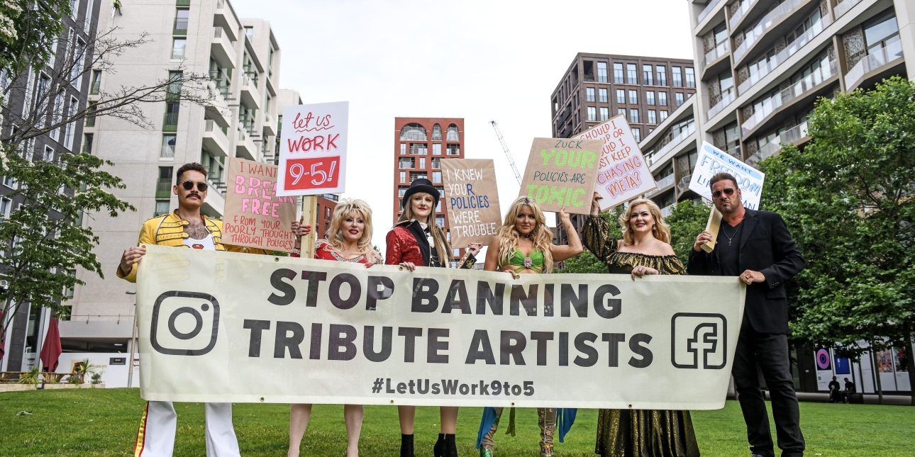 Five impersonators holding placards and a banner stood outside Meta's offices. The acts are impersonators of Freddie Mercury, Dolly Parton, Taylor Swift, Britney Spears, Adele and George Michael